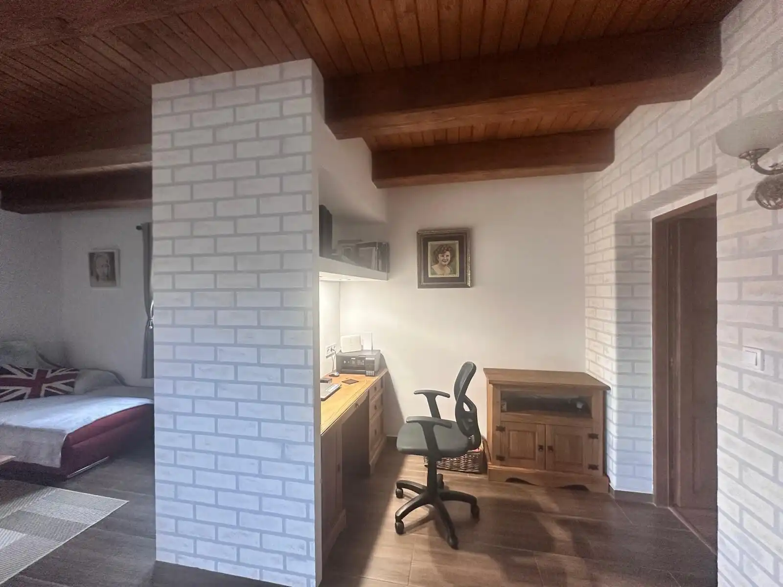 Interior view of a charming country home in Lukovištia, Rimavská Sobota, featuring a workspace and r.