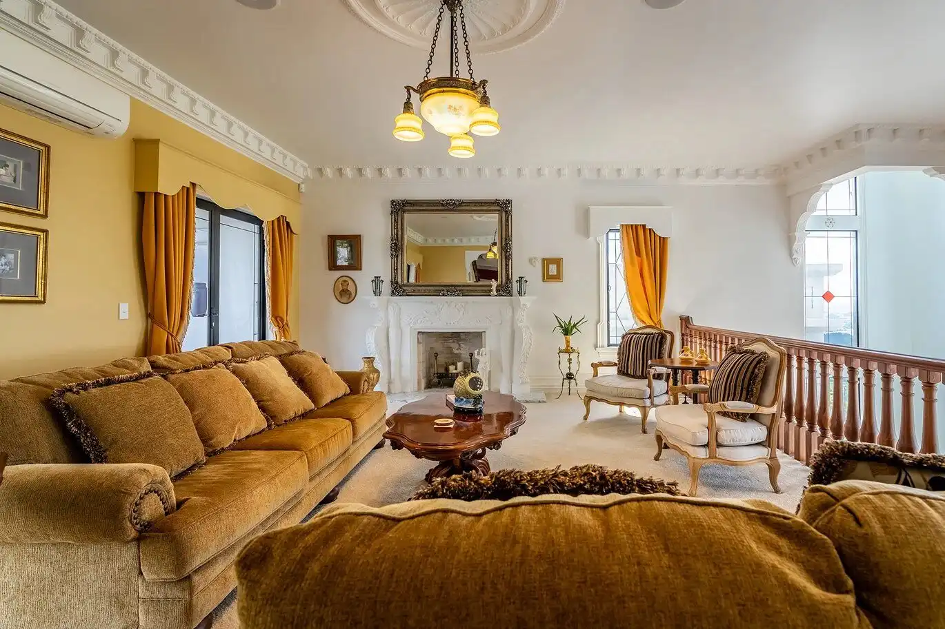 Luxury Château Te Kamo living room with classic decor and spacious seating area.