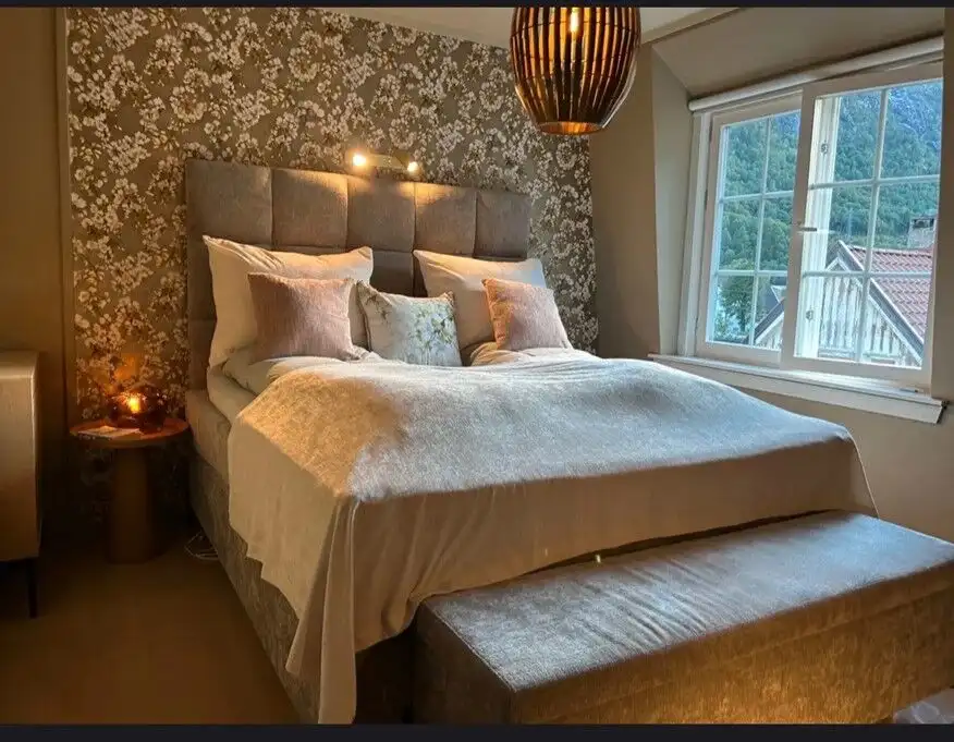 Bright and inviting bedroom with contemporary decor near Gaustatoppen. Perfect for relaxing stays in.