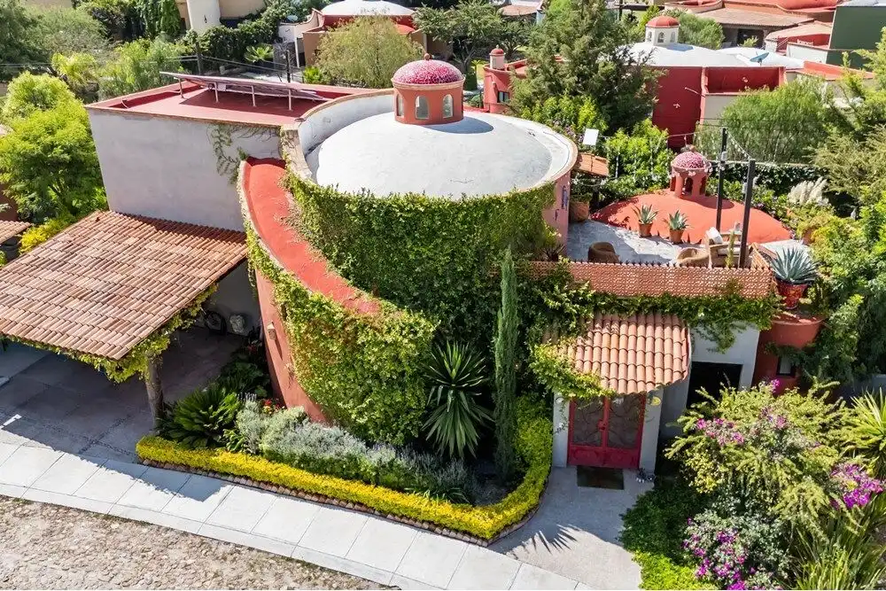 Style home for sale in Rancho Los Labradores, San Miguel de Allende, featuring vibrant gardens and u.