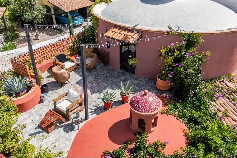 Beautiful outdoor patio with seating and lush greenery in Rancho Los Labradores.