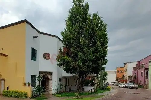 Luxury investment property in San Miguel de Allende with beautiful architecture and lush landscaping.