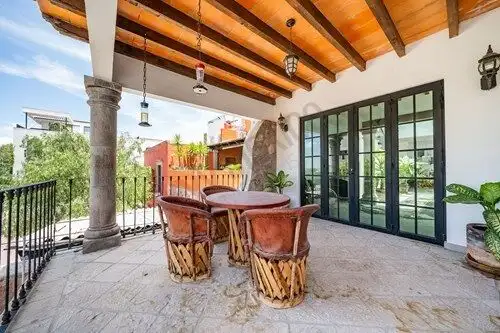 Luxury terrace with outdoor dining in San Miguel de Allende villa.