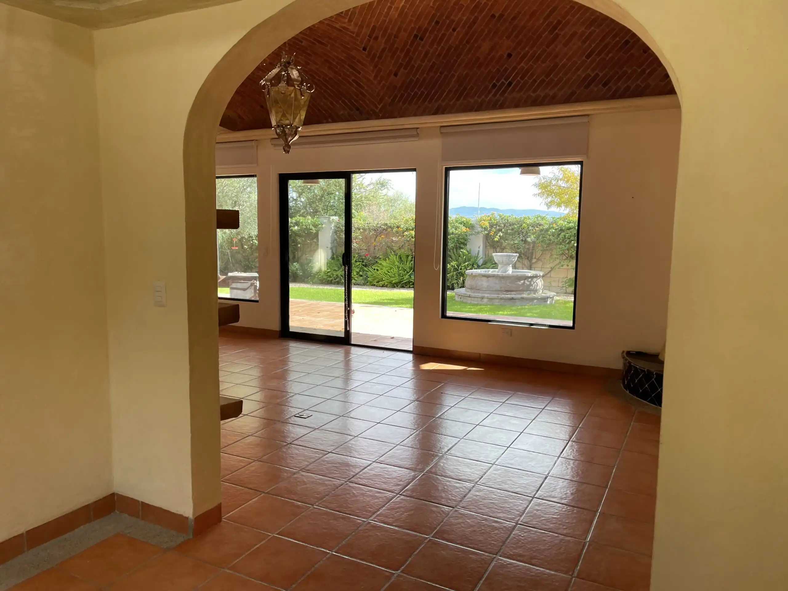 Spacious living area with large windows and scenic views in Rancho Los Labradores, San Miguel de All.