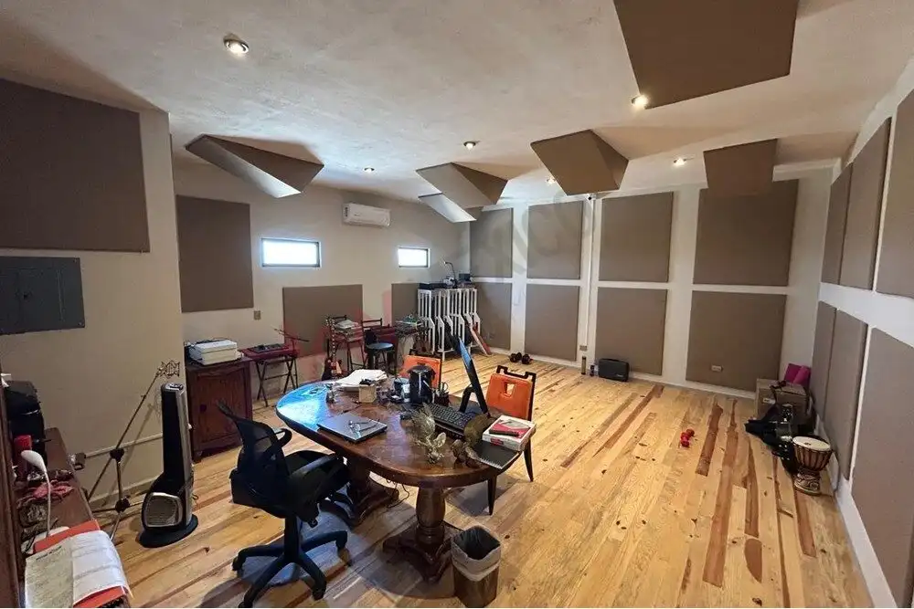 Luxury Country Estate Interior in San Miguel de Allende Elegant interior of a luxury country estate in San Miguel de Allende, featuring modern acoustic wall.