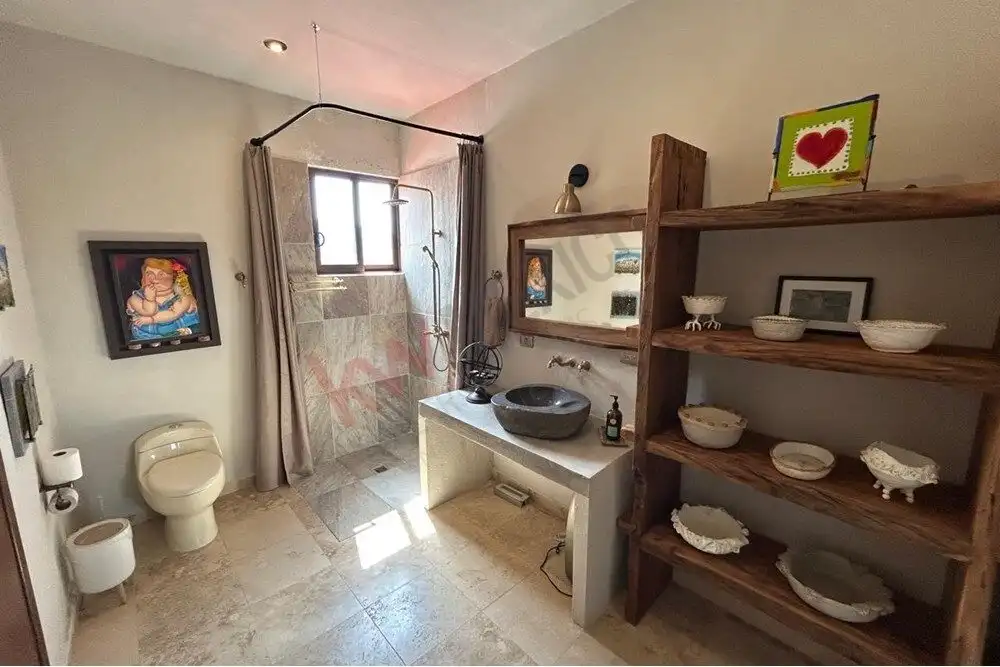 Luxury Country Estate San Miguel de Allende Elegant bathroom with rustic decor and natural light.