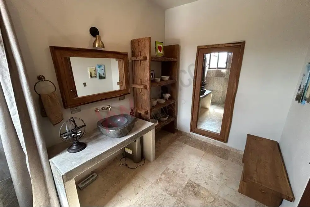 Luxury Country Estate San Miguel de Allende Elegant bathroom with rustic wooden accents and modern fixtures in San Miguel de Allende estate.