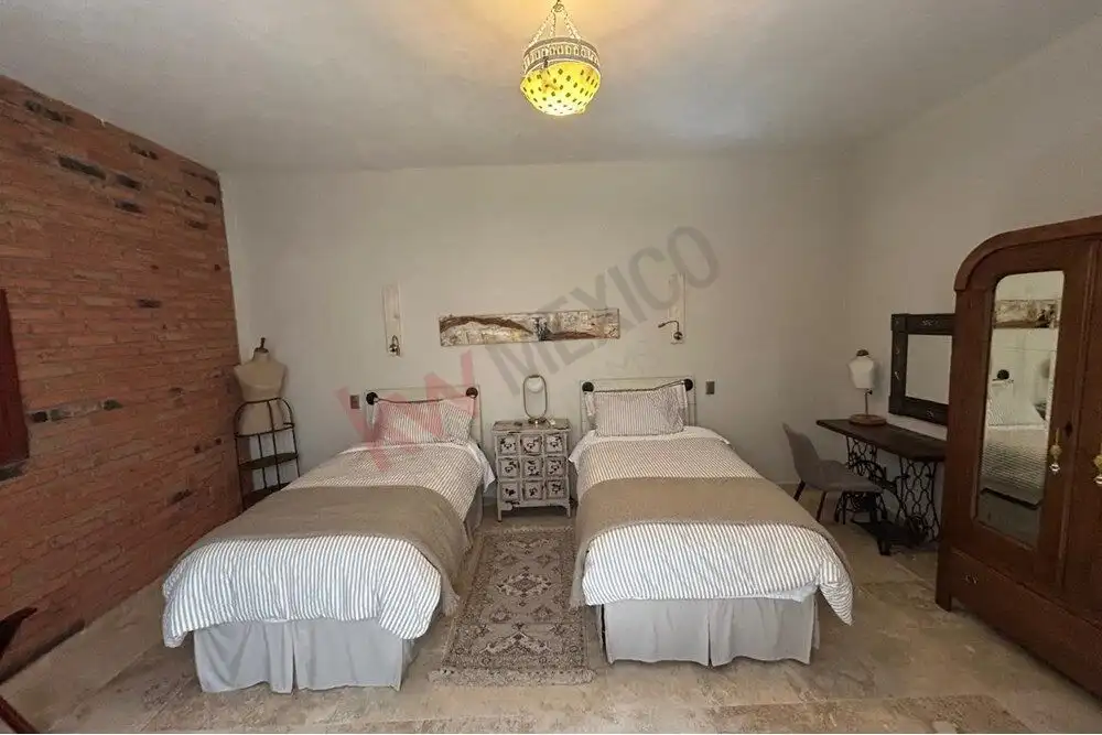Luxury Country Estate Bedroom Elegant bedroom with twin beds in a country estate in San Miguel de Allende.