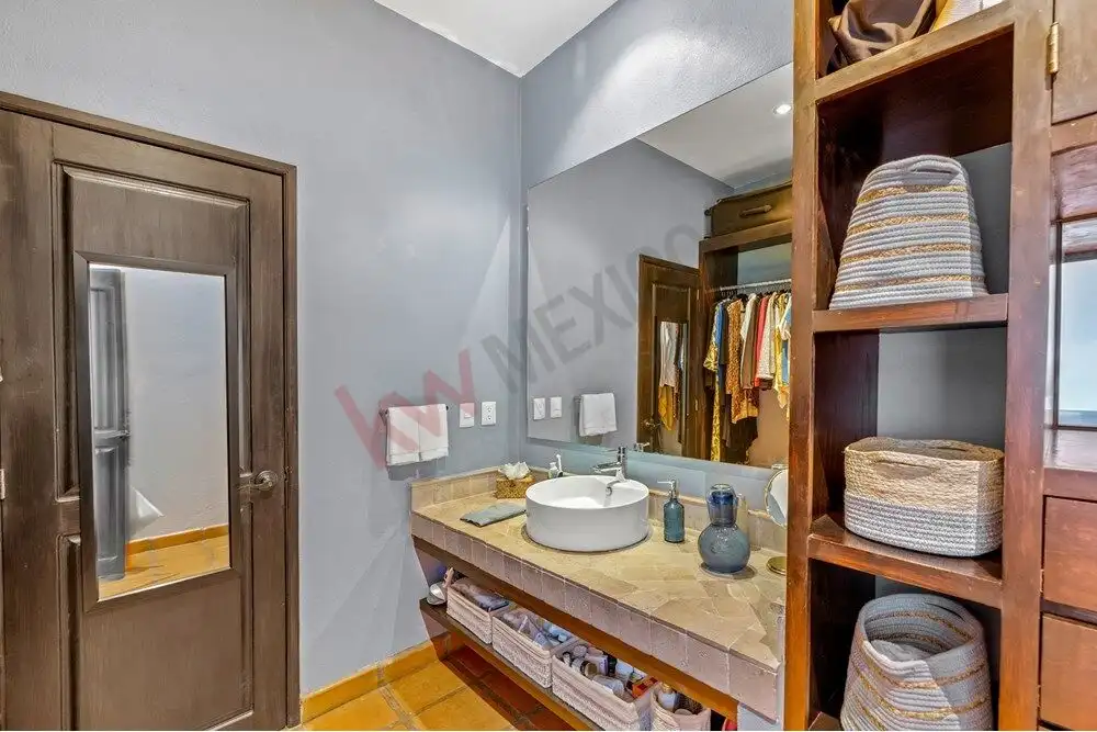 Bathroom with modern fixtures in a remodeled single-level home in Capilla de Piedra.