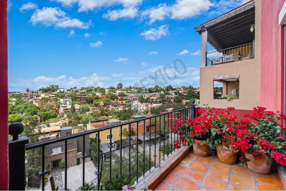 Balcony overlooking colorful cityscape in San Miguel de Allende, perfect for enjoying scenic views a.