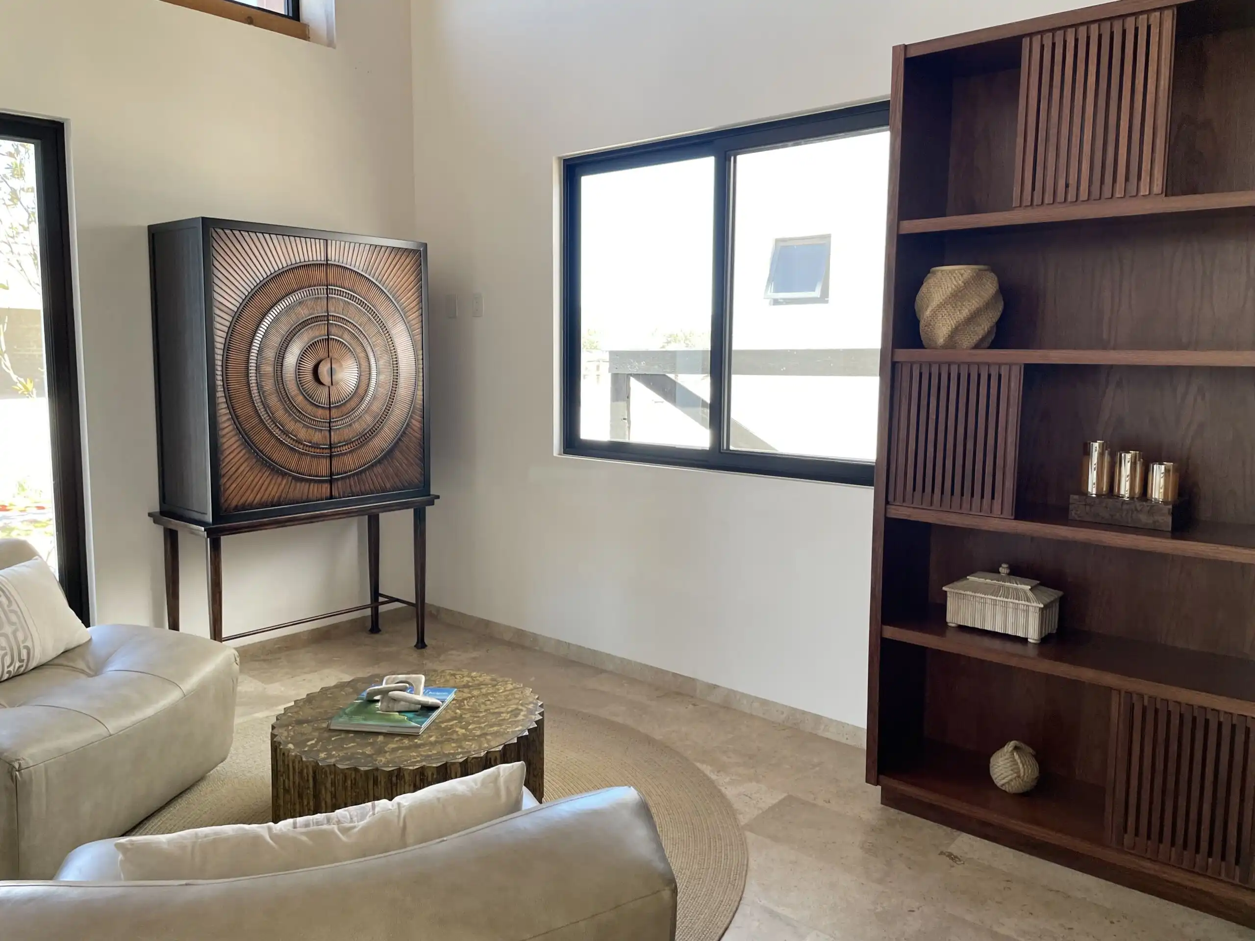 Elegant living room with modern decor and natural light in San Miguel de Allende.