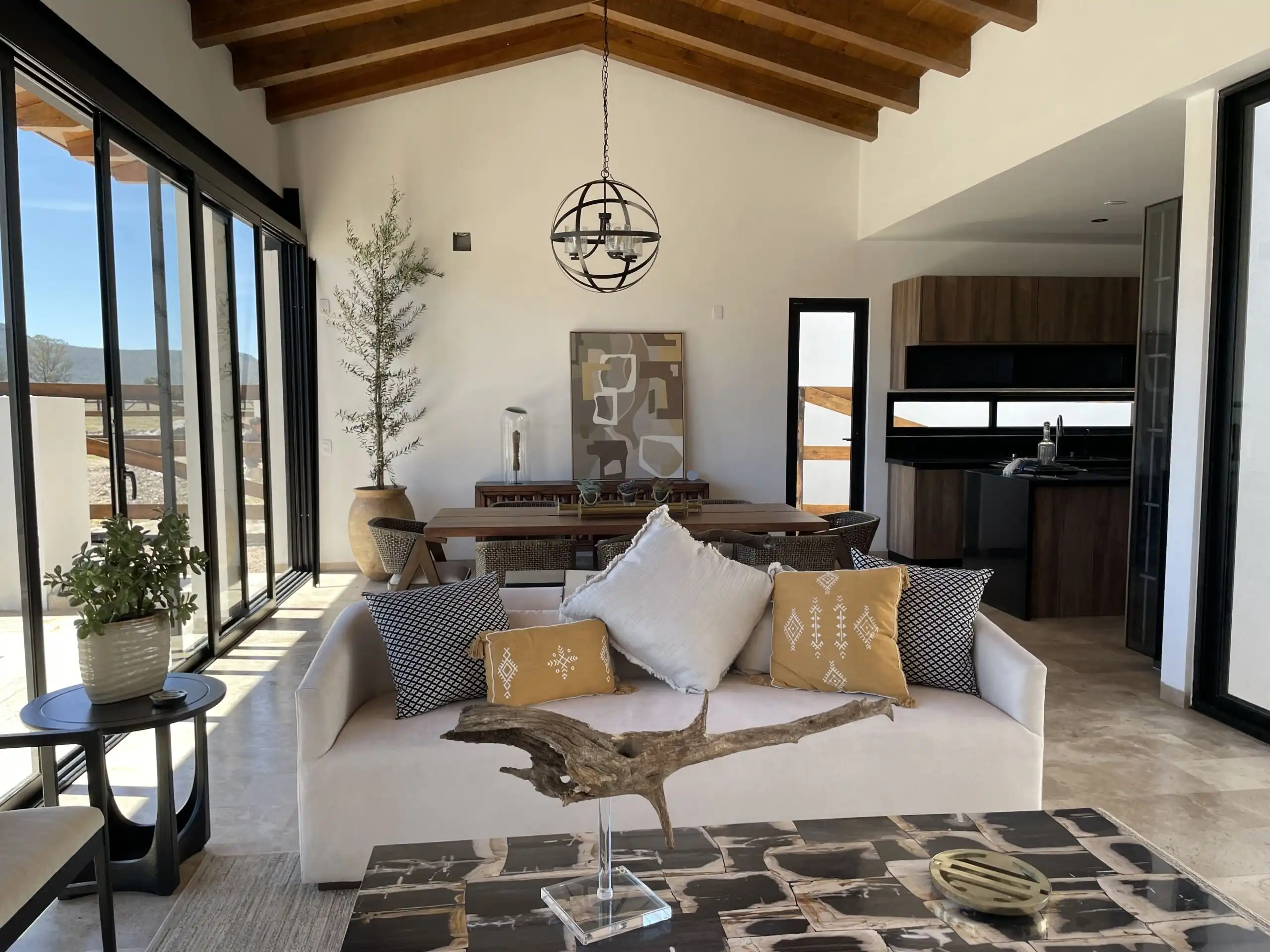 Spacious interior of Casa Renacer with natural light and contemporary decor.