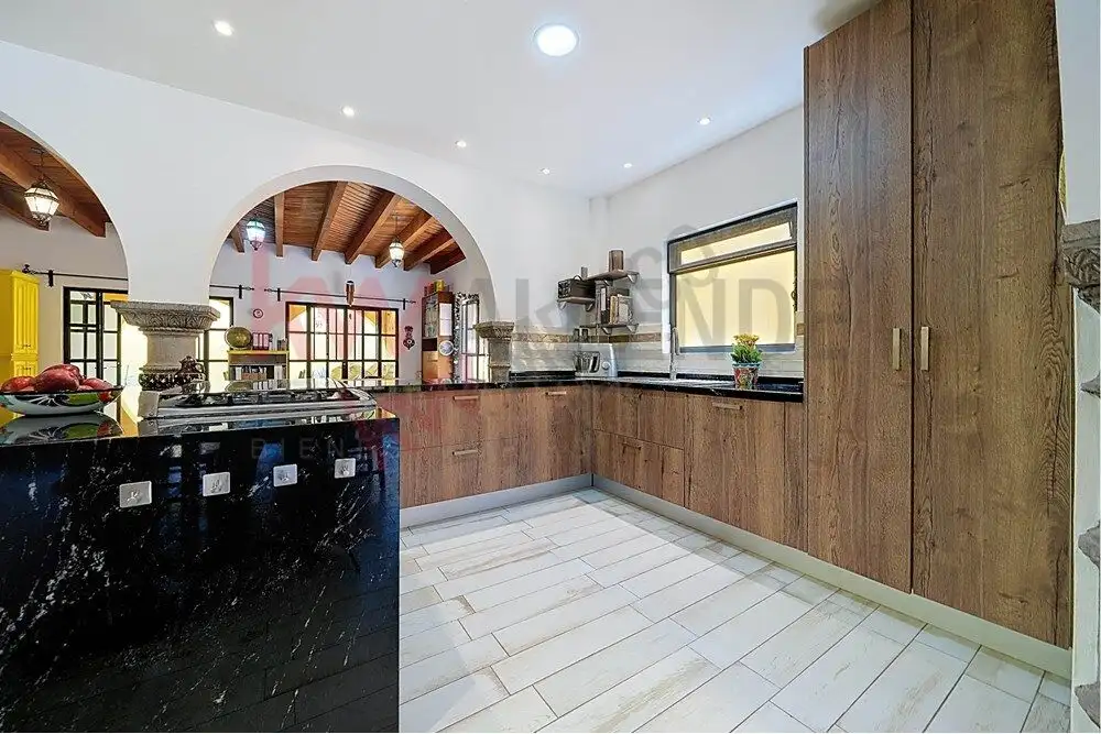 Style 4-Bedroom Kitchen for Sale Style kitchen with wooden cabinets and modern appliances in San Miguel de Allende.