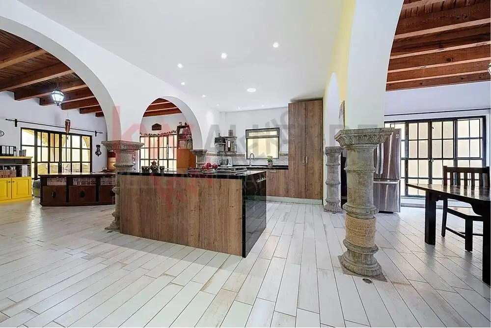 Style 4-Bedroom Home Interior Style kitchen with wooden accents and modern appliances in San Miguel de Allende.