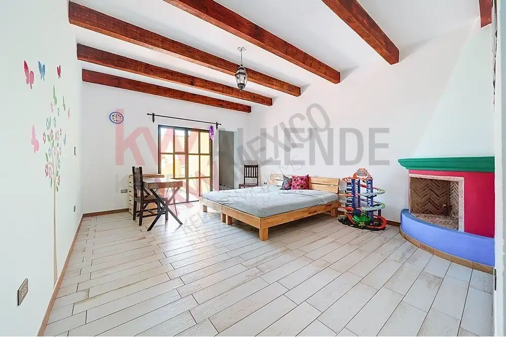 Style 4-Bedroom Home for Sale on Avenida Paseo Real Spacious bedroom in a colonial-style home located on Avenida Paseo Real, San Miguel de Allende.