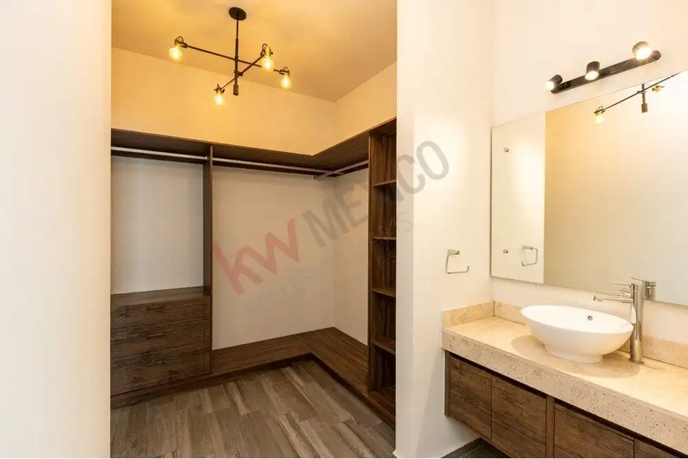 In closet with ample storage in a luxurious San Miguel de Allende home.