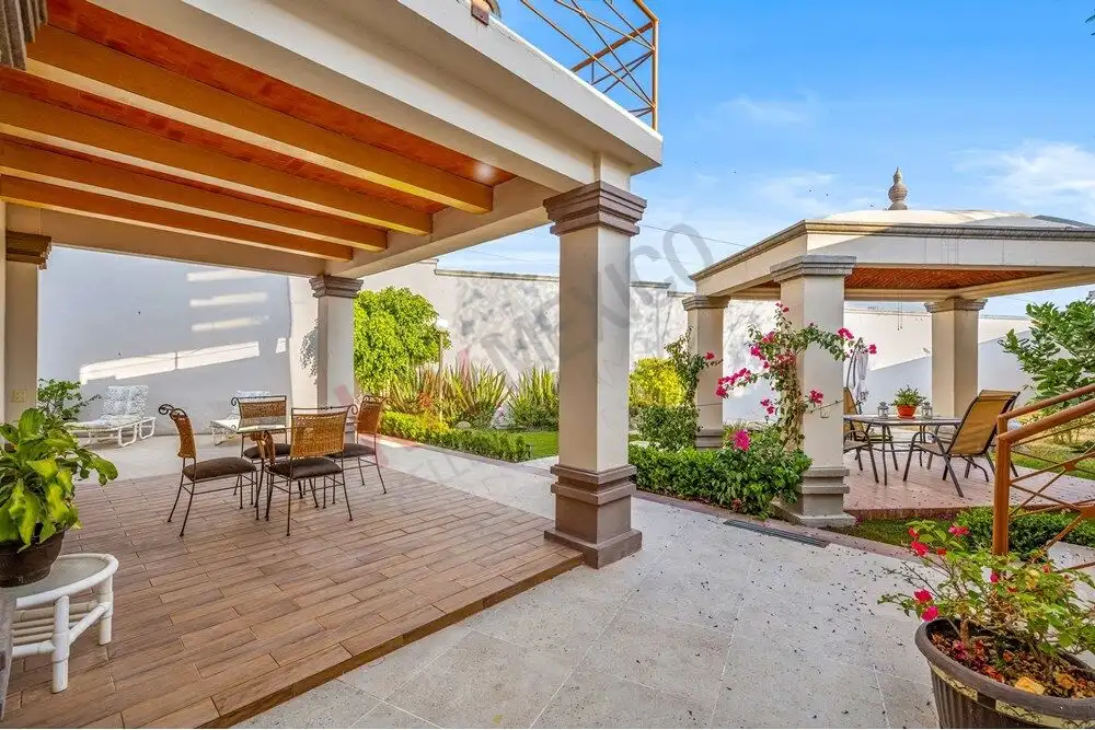 Elegant outdoor terrace with panoramic views in a luxury colonial home in San Miguel de Allende.