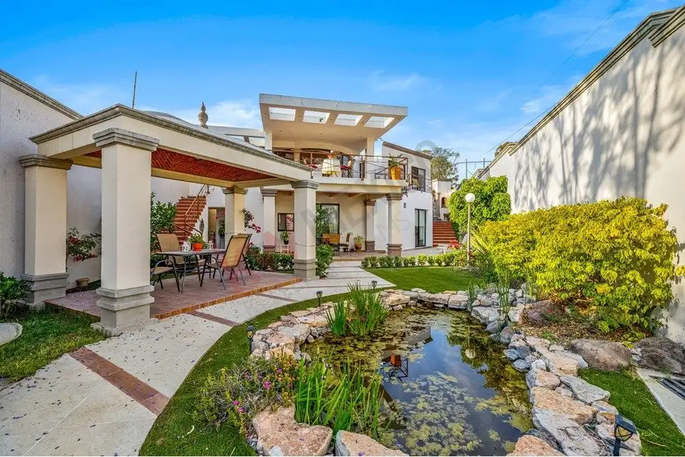 Style home with lush garden and tranquil pond in San Miguel de Allende. Perfect for luxurious living.