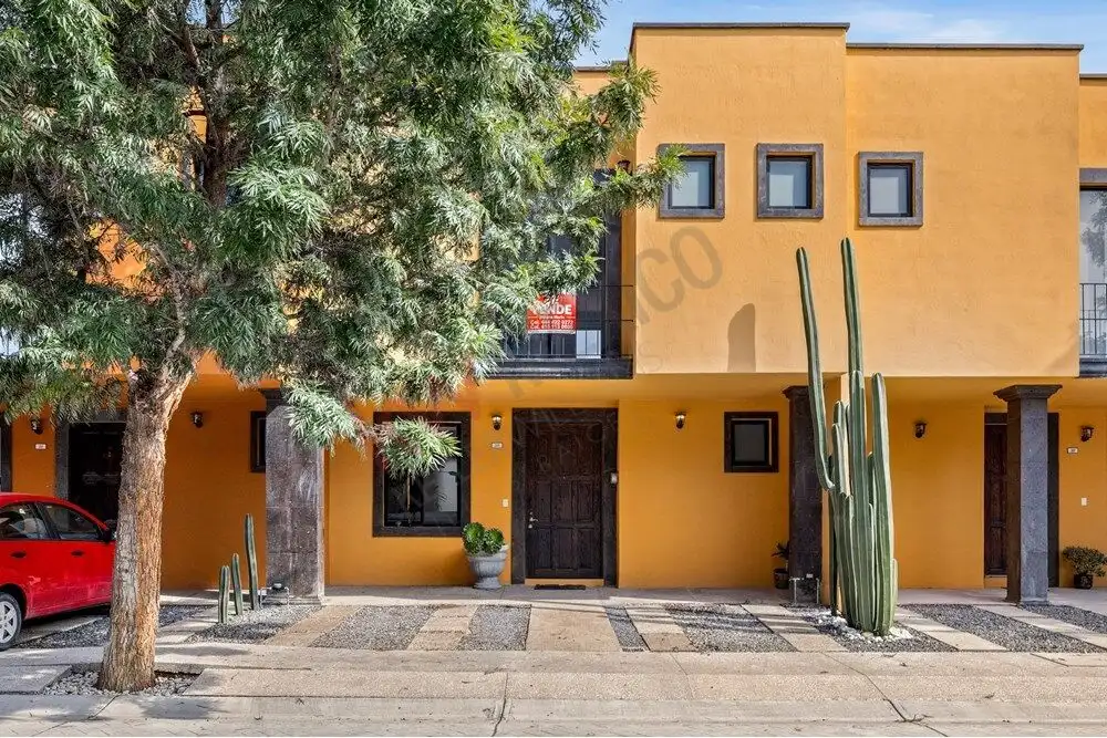 Charming yellow modern home with rooftop terrace in San Miguel de Allende. Move-in ready property wi.