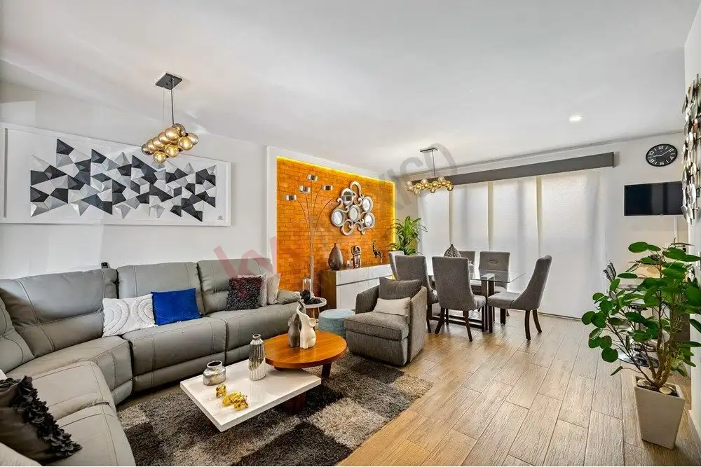 Beautiful living room with modern decor and spacious seating area.