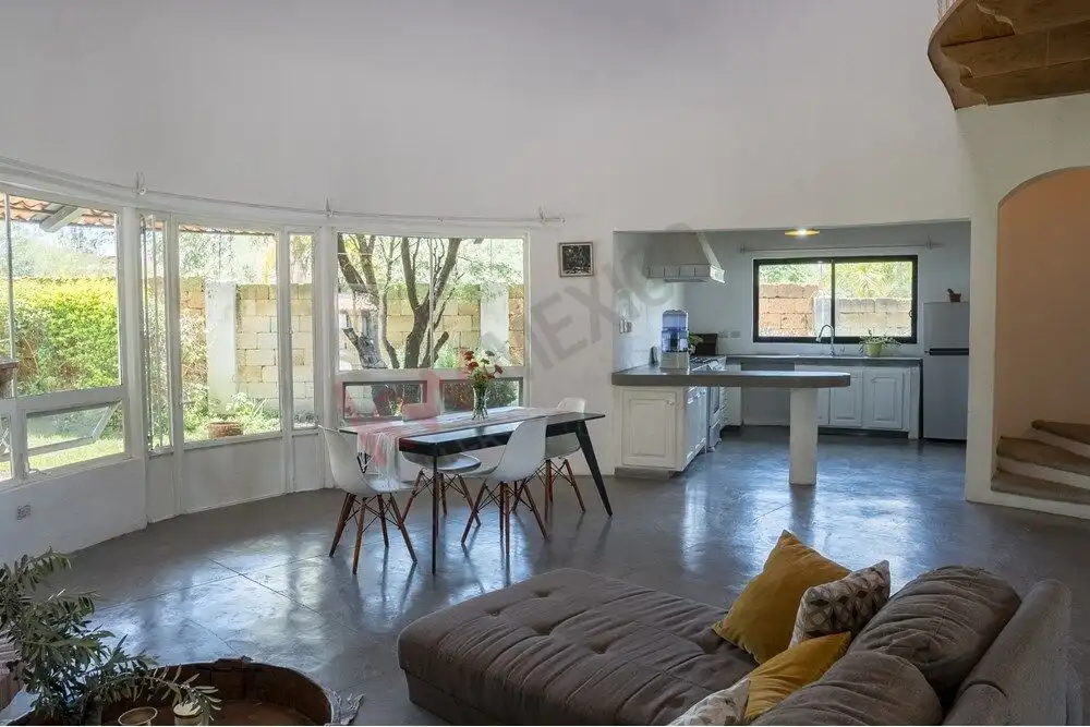 Modern Rancho Los Labradores Home Spacious living room with large windows and open kitchen in Rancho Los Labradores, San Miguel de All.