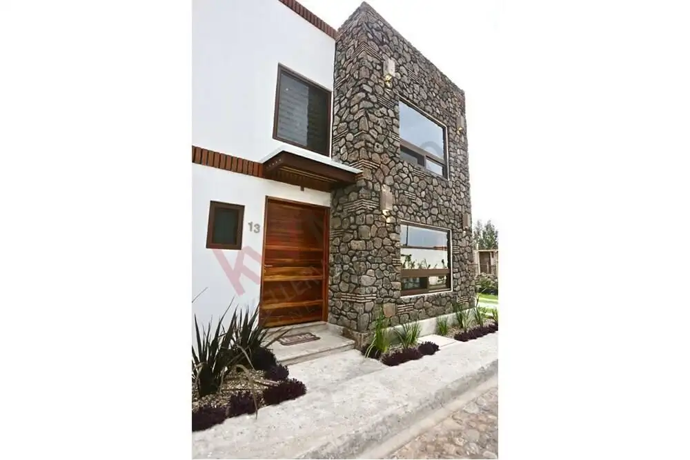 Beautiful contemporary home with stone accents and large windows in San Miguel de Allende.