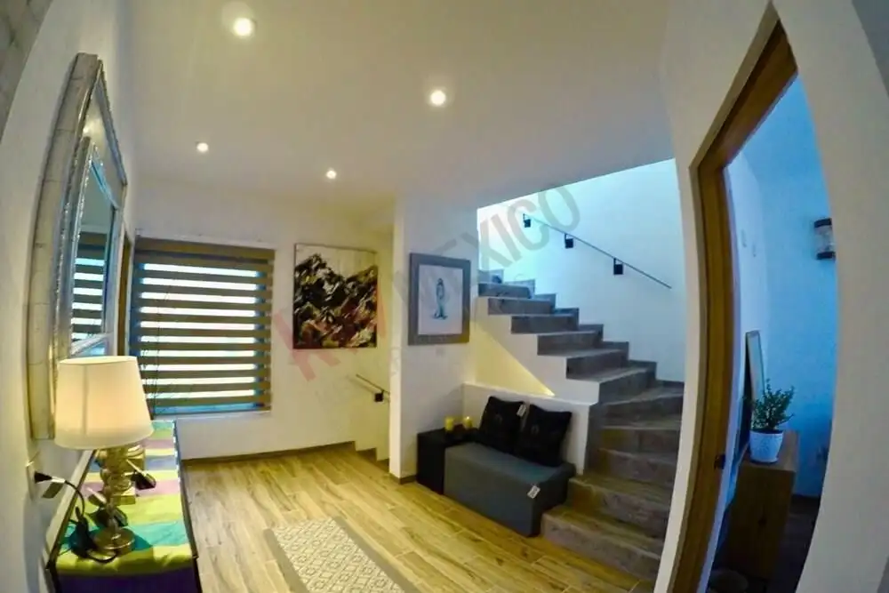 Bright living room featuring contemporary furniture and stylish decor in a San Miguel de Allende hom.