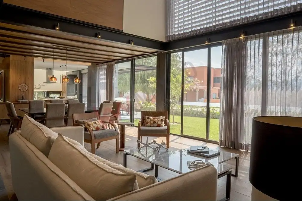 Luxury home with spacious living area and large windows in Ventanas Golf Club, San Miguel de Allende.