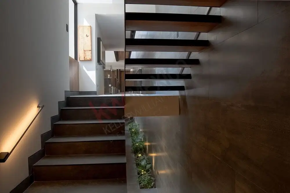 Elegant staircase with dark wood steps and minimalist design.