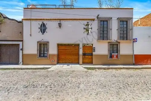 Style home with wooden doors and traditional windows in Colonia Guadalupe. Perfect for a spacious fa.