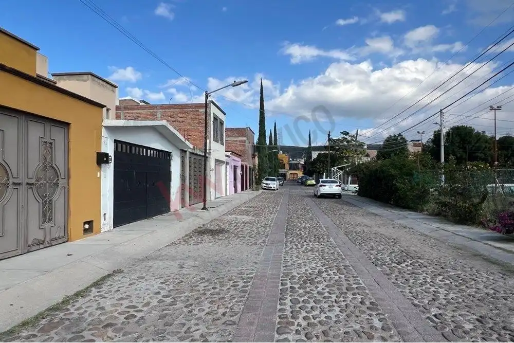 Charming San Miguel de Allende Street Scene Cozy residential street in Guadalupe Mexiquito, San Miguel de Allende, featuring colorful houses and.