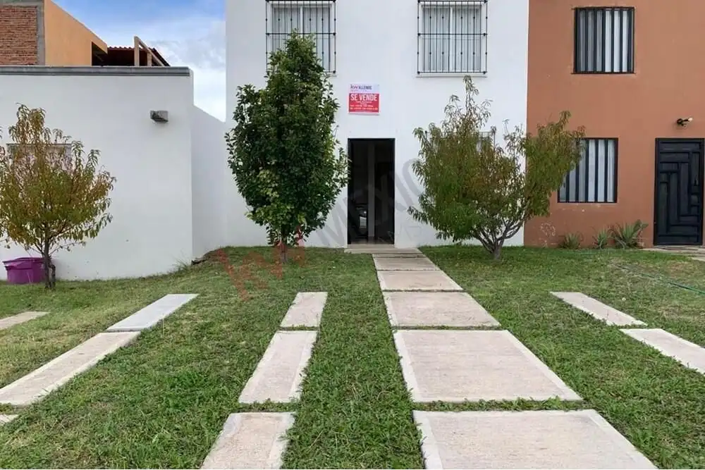 Charming San Miguel de Allende Home Beautiful front view of Casa Durazno in La Vista community, featuring a modern design and lush lands.