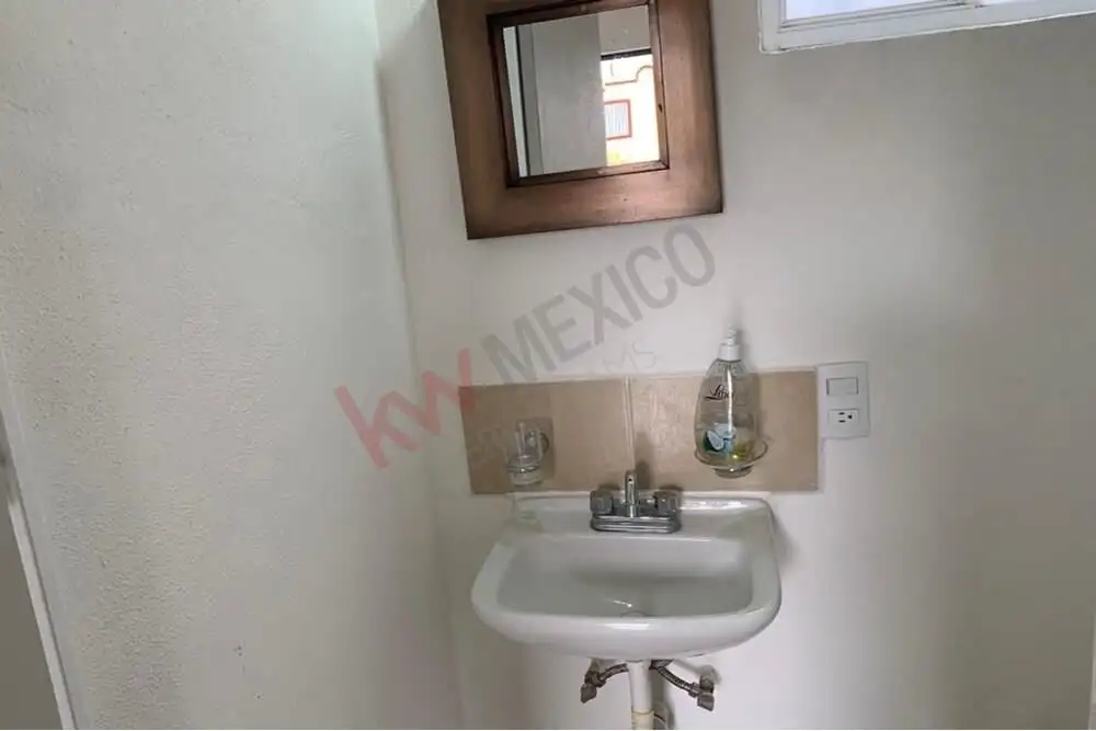 Casa Durazno – Affordable Home in San Miguel de Allende Small bathroom with sink and mirror in San Miguel de Allende.