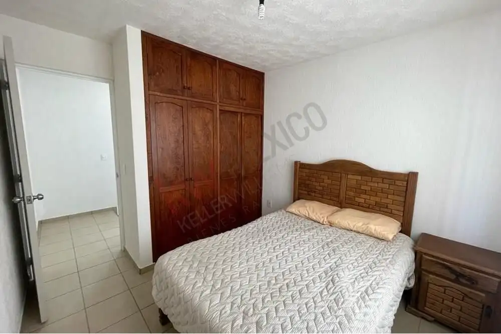 Cozy Bedroom in San Miguel de Allende Home Comfortable bedroom with wooden wardrobe in San Miguel de Allende’s La Vista community. Affordable h.