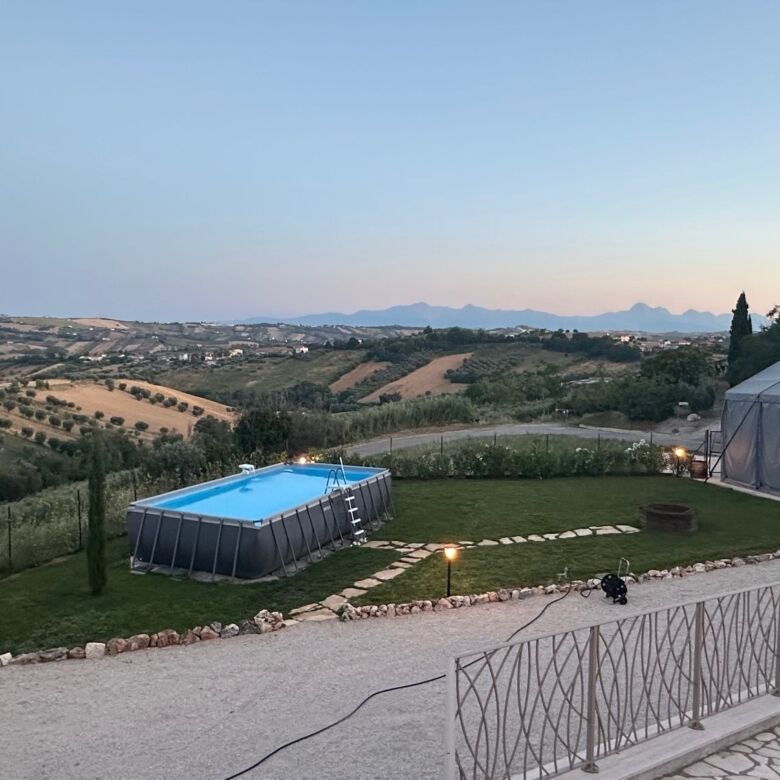 Beautiful luxury villa featuring a private pool and scenic countryside views in Tortoreto, Italy. Pe.