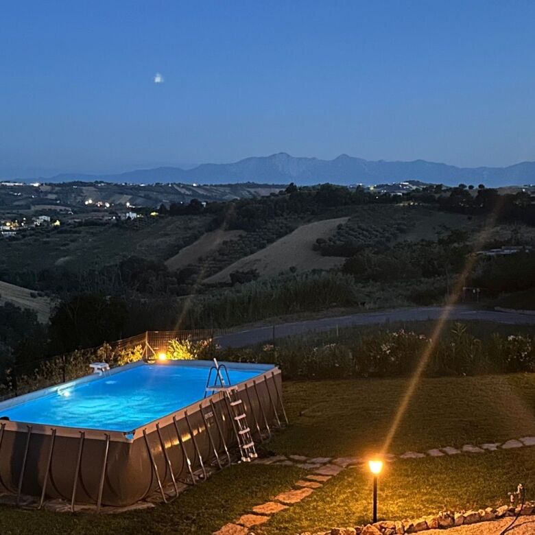 Spacious 5-bedroom villa with private pool in scenic Tortoreto, Italy, offering stunning mountain vi.