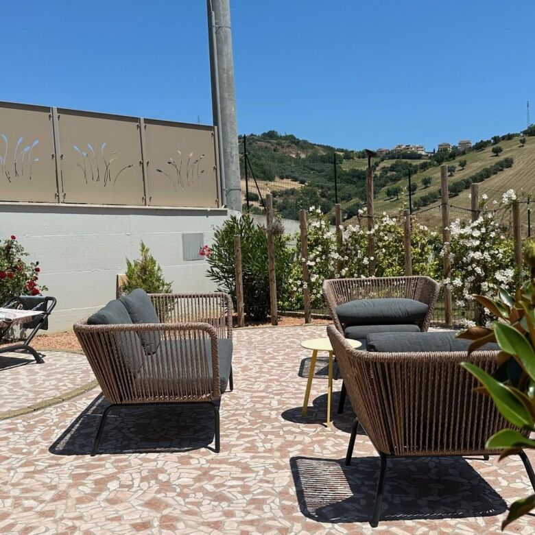 Luxury 5-bedroom villa outdoor terrace in Tortoreto, Italy. Perfect for relaxing and enjoying scenic.