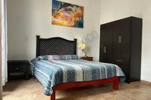 Comfortable bedroom in Rancho Los Labradores, San Miguel de Allende, featuring a cozy bed and modern.