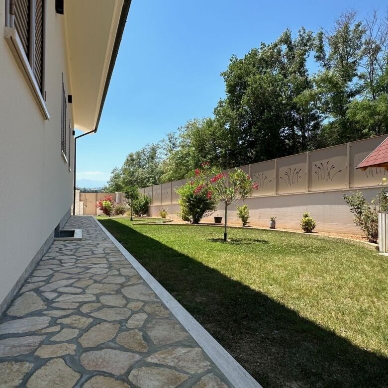 Beautiful garden and pathway of a luxury 5-bedroom villa in Tortoreto, Italy.