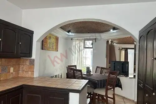 Story home in Rancho Los Labradores, San Miguel de Allende, featuring a welcoming dining area and mo.