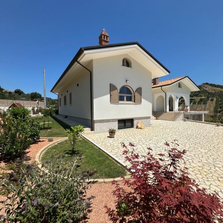 Luxury 5 Bed Villa for Sale in Tortoreto, Italy with spacious garden and scenic views.