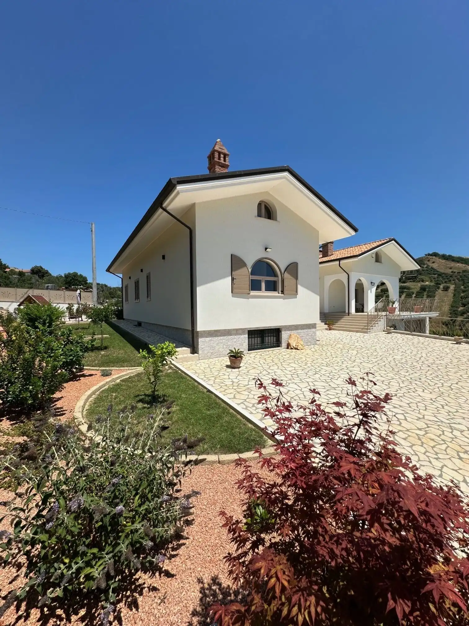 Luxury 5 Bed Villa for Sale in Tortoreto, Italy with spacious garden and scenic views.