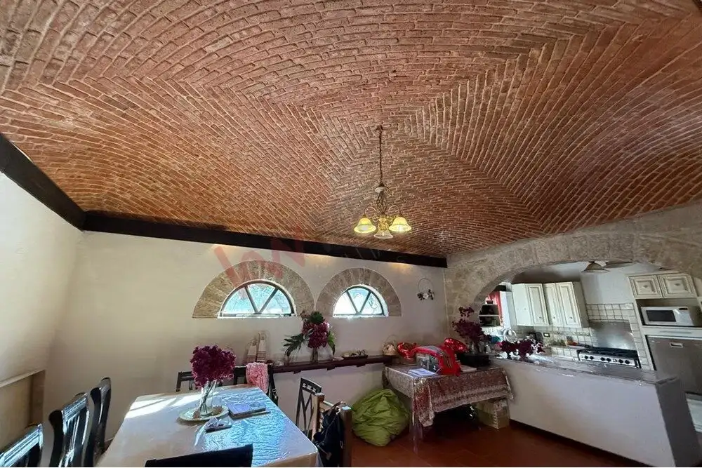 Charming Villa de Los Frailes Home Spacious interior of a multi-unit home with rental income potential in Villa de Los Frailes, San Mig.