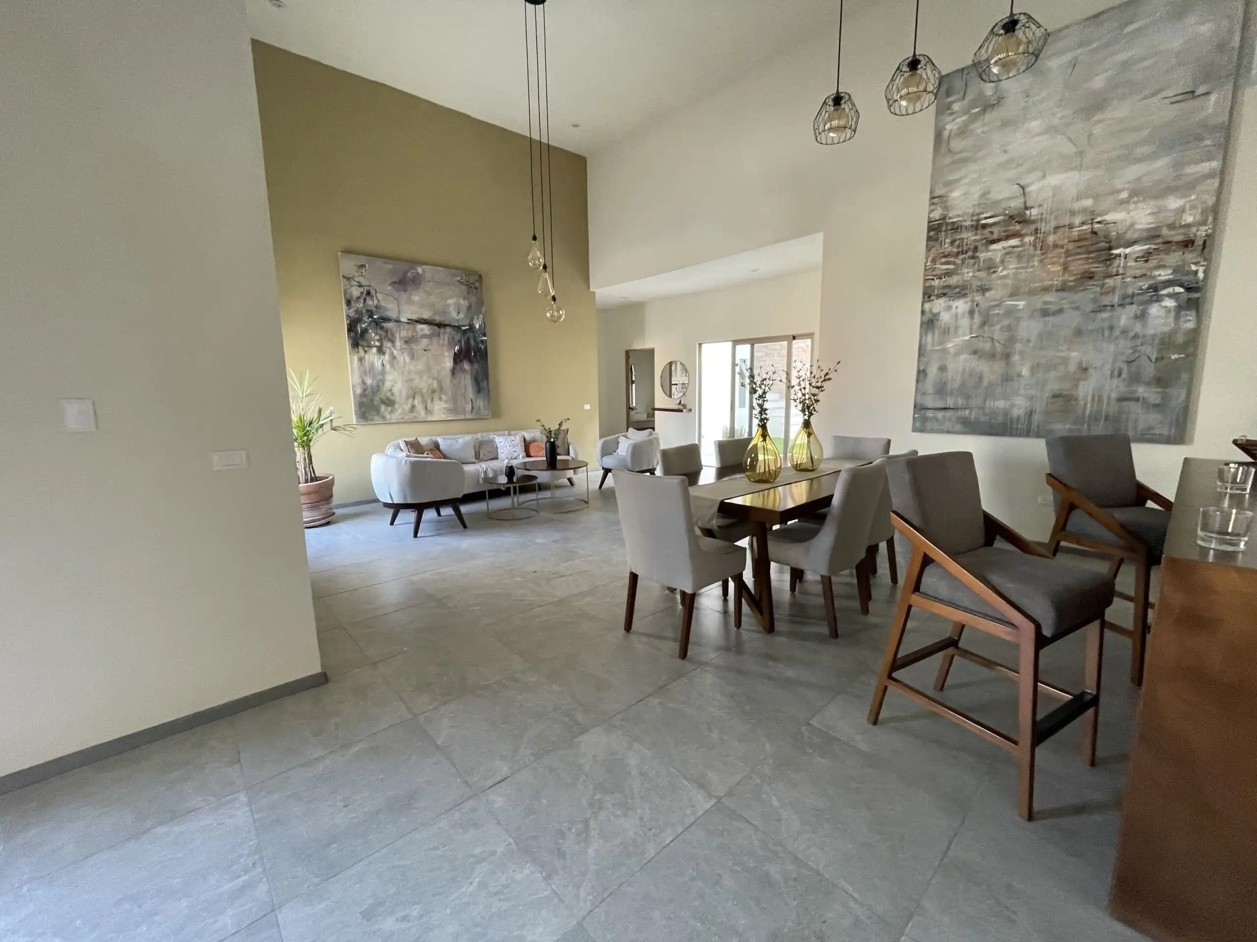 Story 3-bedroom home in Residencial Barroco, Modelo Tule. Spacious living area with stylish decor an.