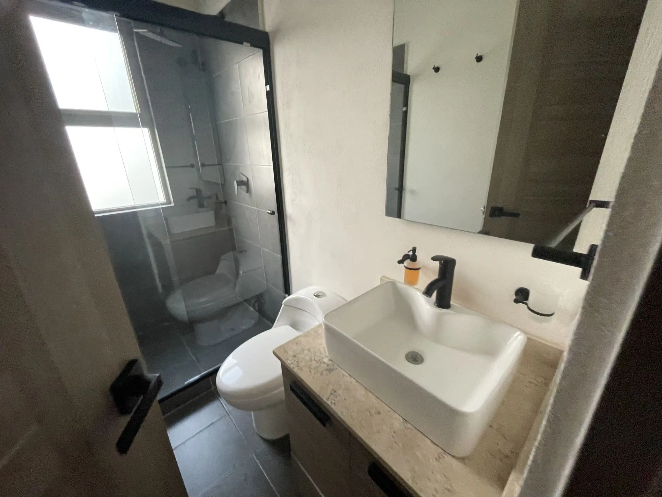 Modern Home Bathroom in Residencial Barroco Contemporary bathroom with modern sink and shower in Residencial Barroco, San Miguel de Allende.