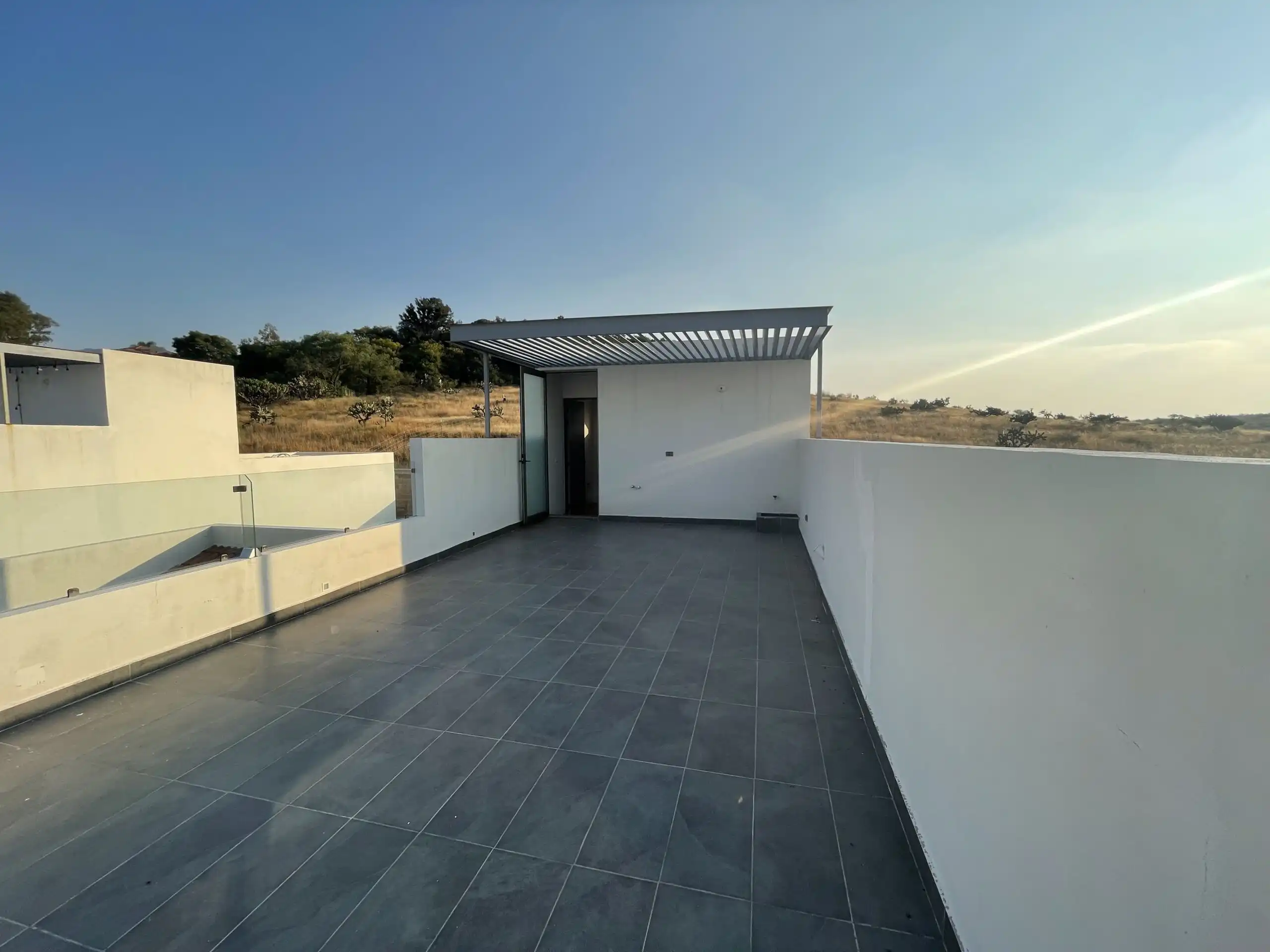 Modern Home Terrace in San Miguel de Allende Terrace view of a modern home in Residencial Barroco, San Miguel de Allende, with spacious outdoor a.