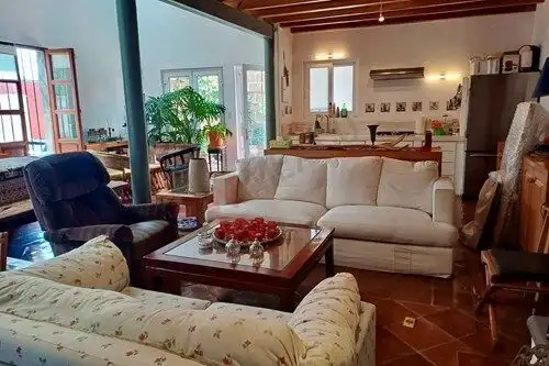 Cozy fully furnished loft with modern decor, spacious living area, and natural light in La Lejona, S.