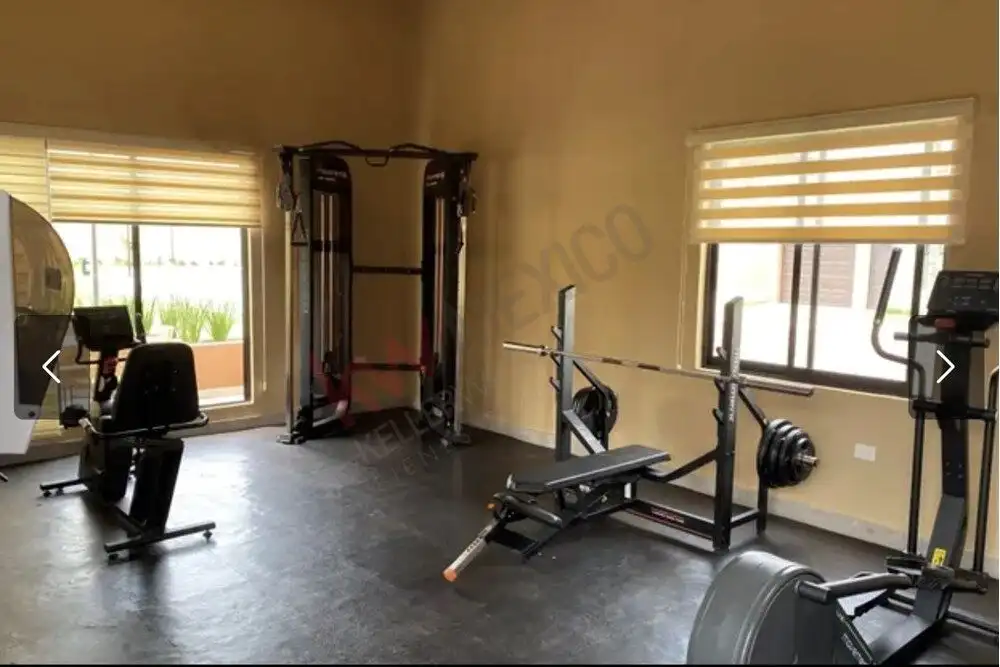 Floor apartment fitness room with gym equipment in Arcos de San Miguel.