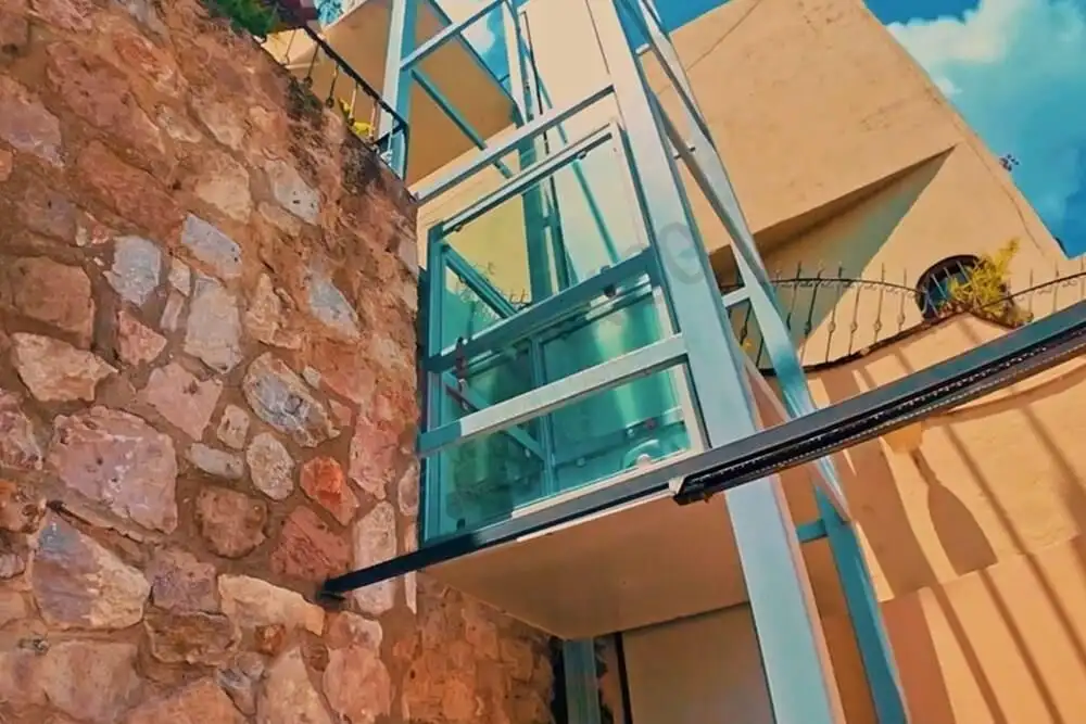 Modern glass elevator for easy access in a stylish home.