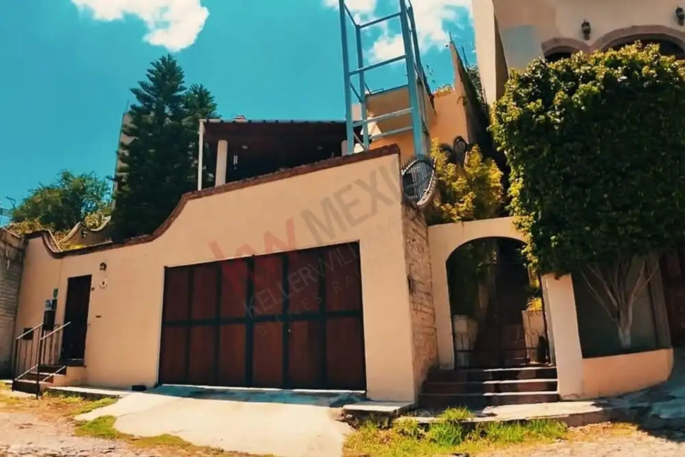 Panoramic view of a contemporary three-level house with elevator in San Miguel de Allende.
